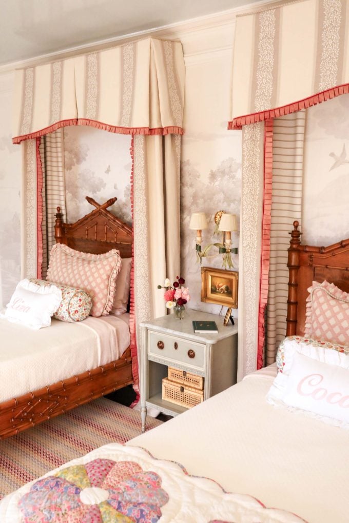 Little girls bedroom decor with safari wallpaper, pleated pink trim, missoni stark carpet, liberty london fabric.
